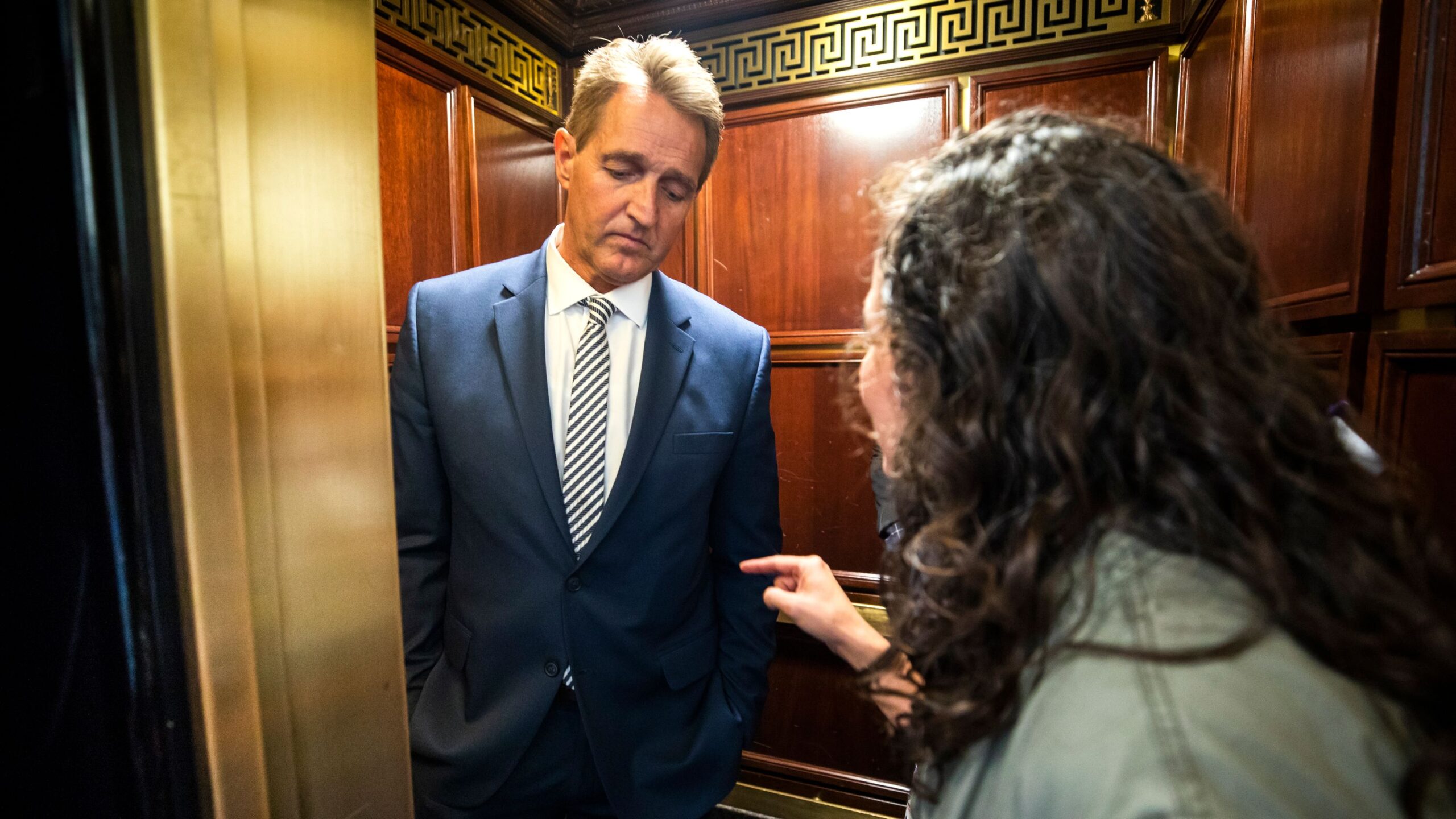 Jeff Flake confronted by #METOO protester