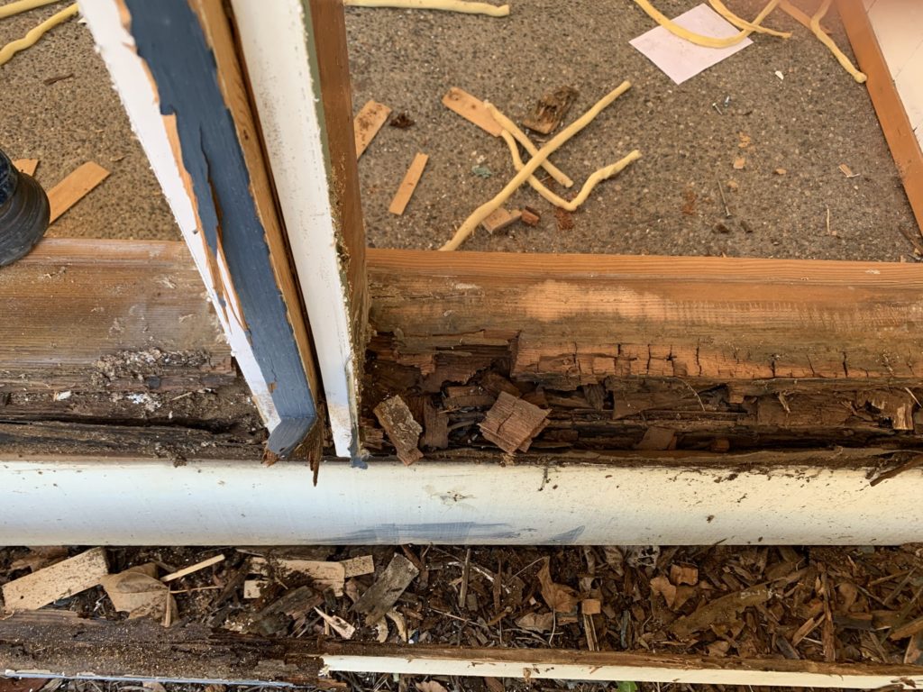Rotted exterior door frame at Port package recipient home
